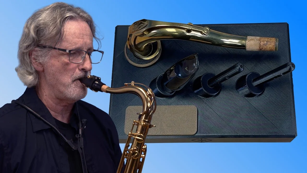 A saxophonist playing, beside the 3D-printed Sax Stack holding a saxophone neck, a mouthpiece, and two drying posts